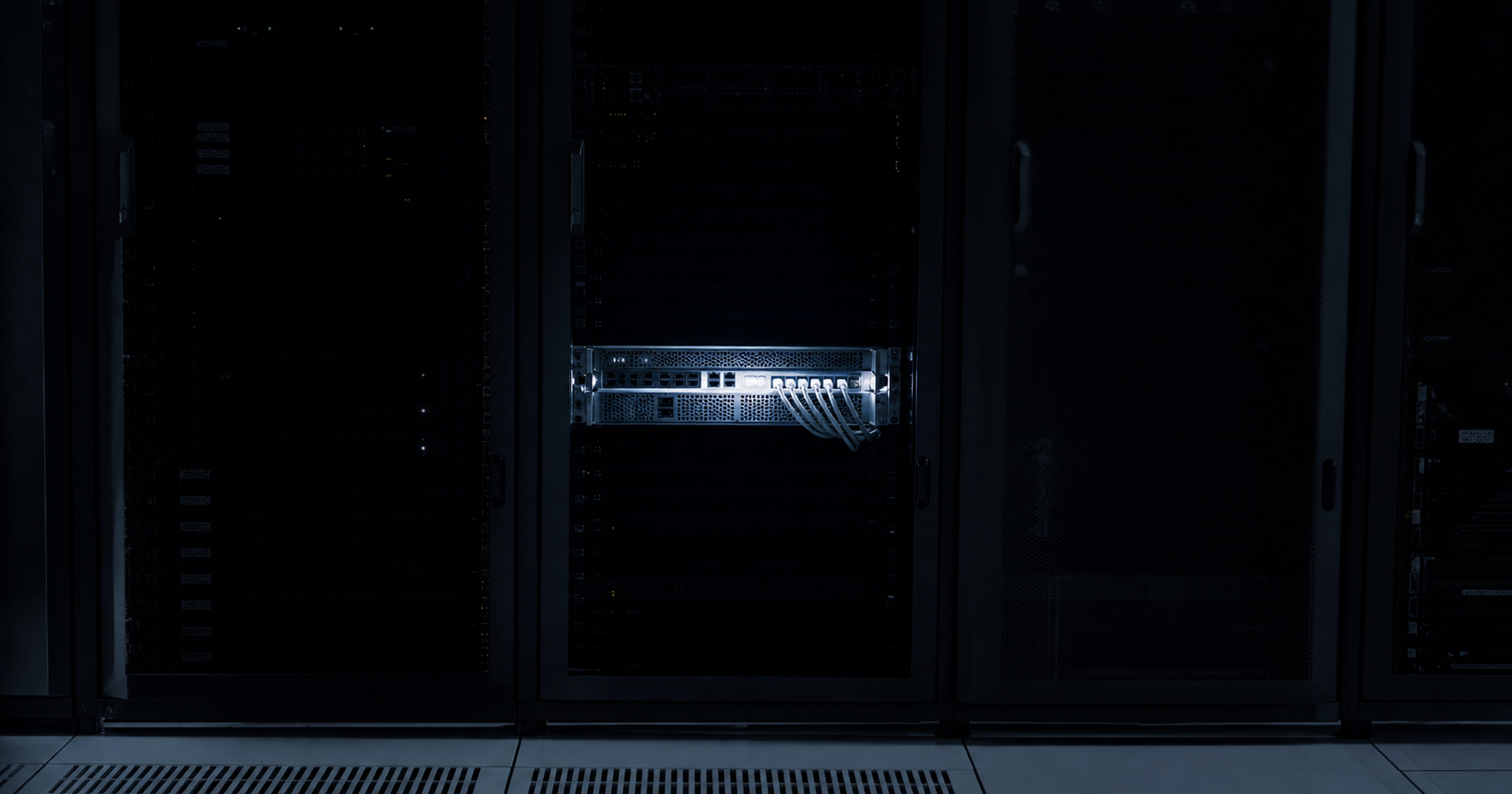 A dark server room with a single illuminated rack unit, symbolizing a minimal internet infrastructure presence.