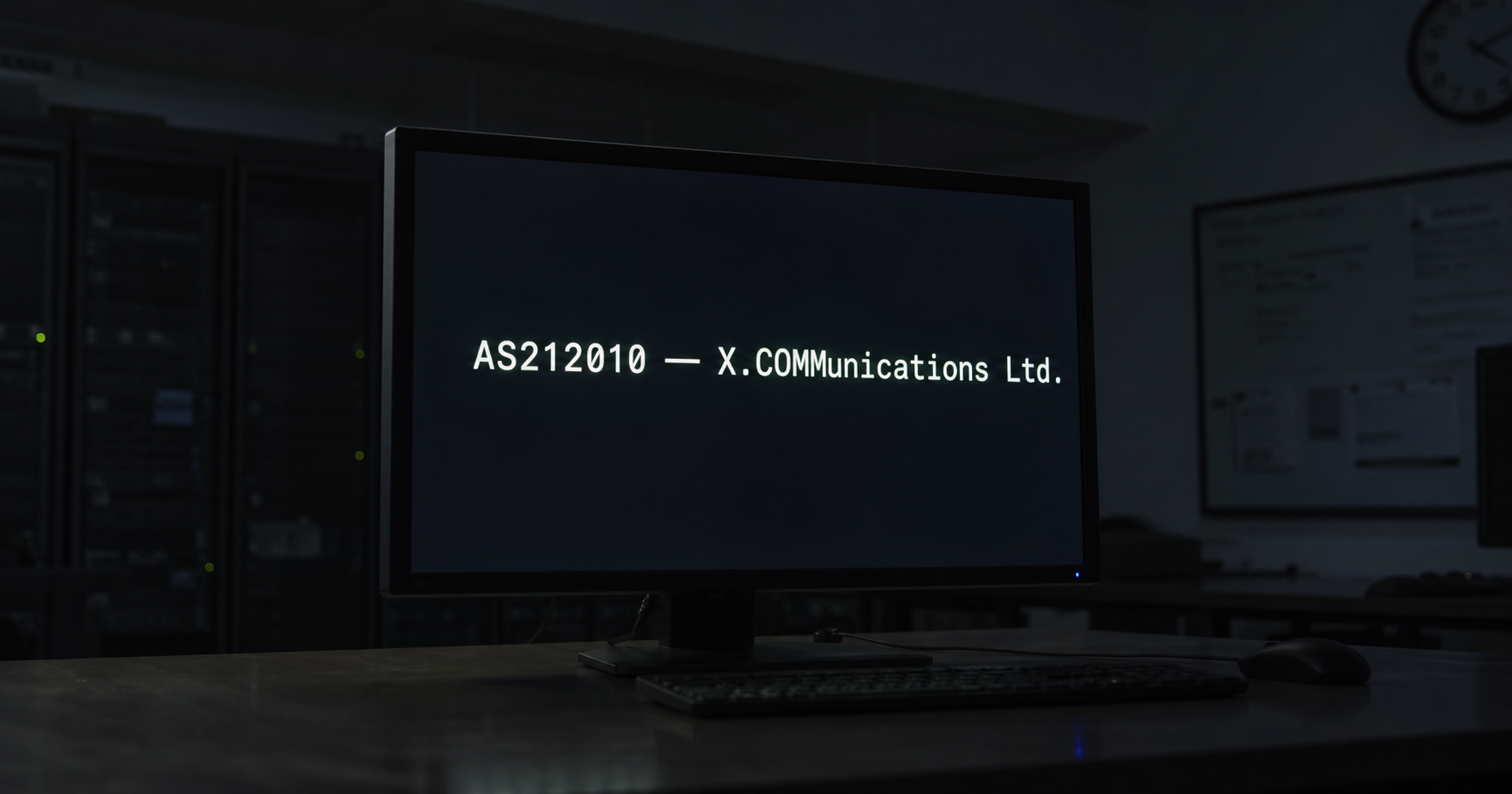 Terminal showing AS212010 registry entry next to an inactive network rack.