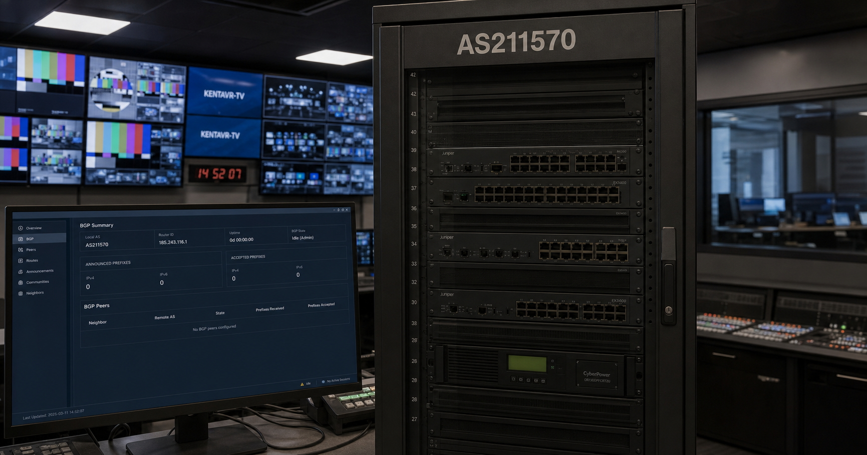 A dark server rack with AS211570 label and a monitor showing no active prefixes, in a broadcast control room.