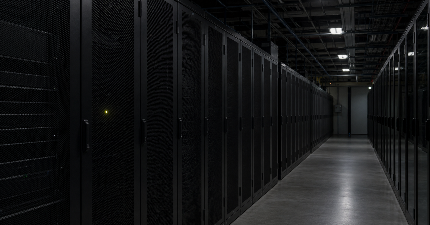 Dormant data center with a single lit indicator.