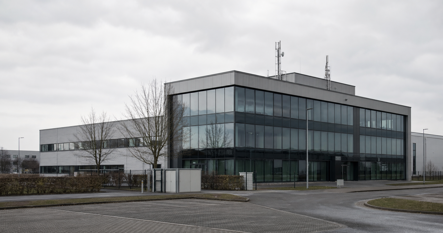 A plain office building representing the unconfirmed physical presence of DATAMATIX Datensysteme GmbH, evoking its registry-based existence.