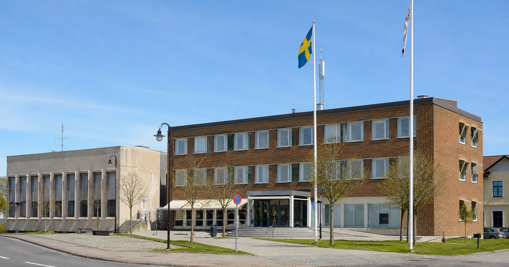 Exterior view of Hällefors municipal offices or town hall, a modern Scandinavian building, representing the local government institution.