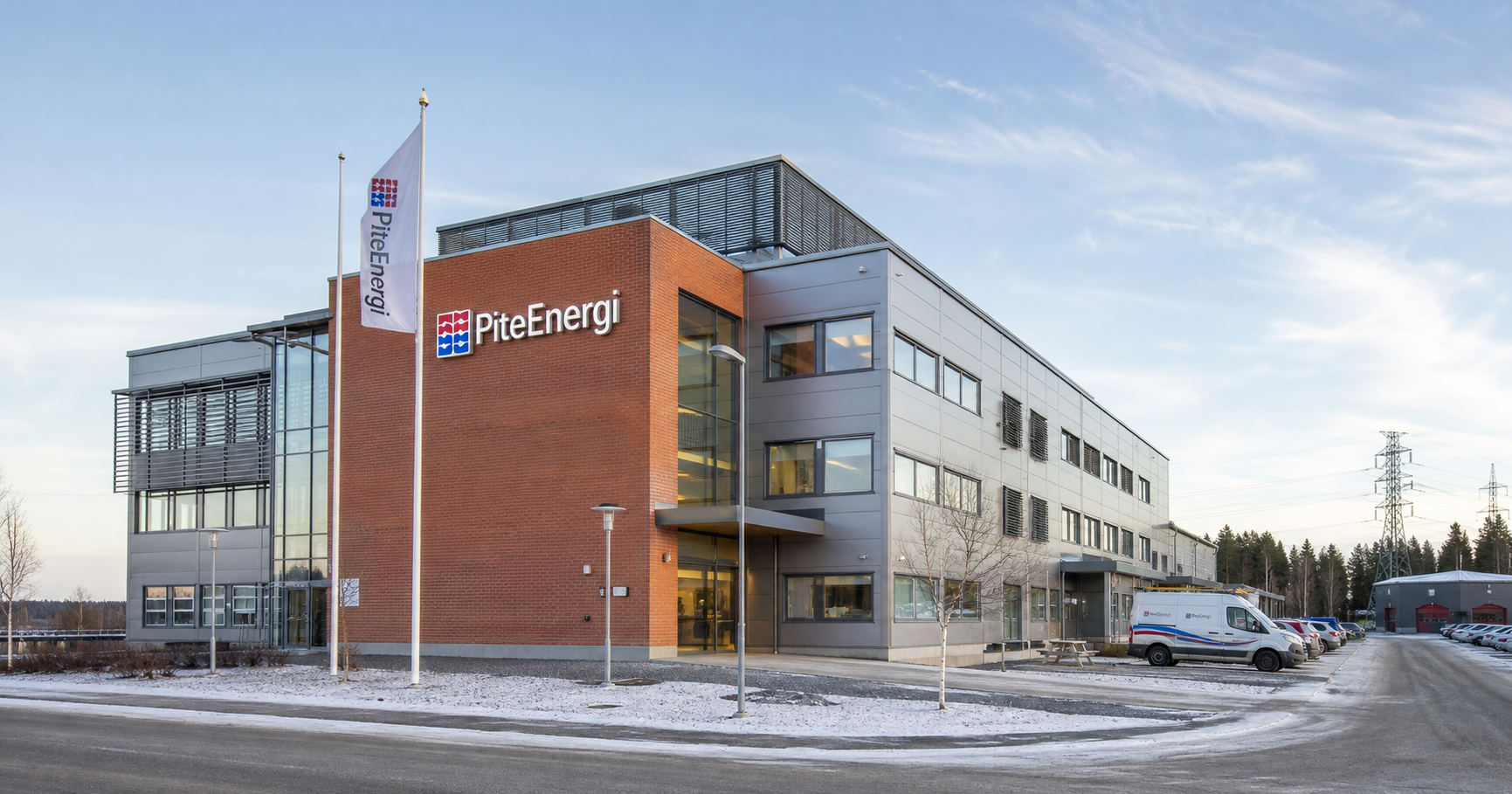 Exterior of AB Piteenergi office in Piteå with company branding visible.