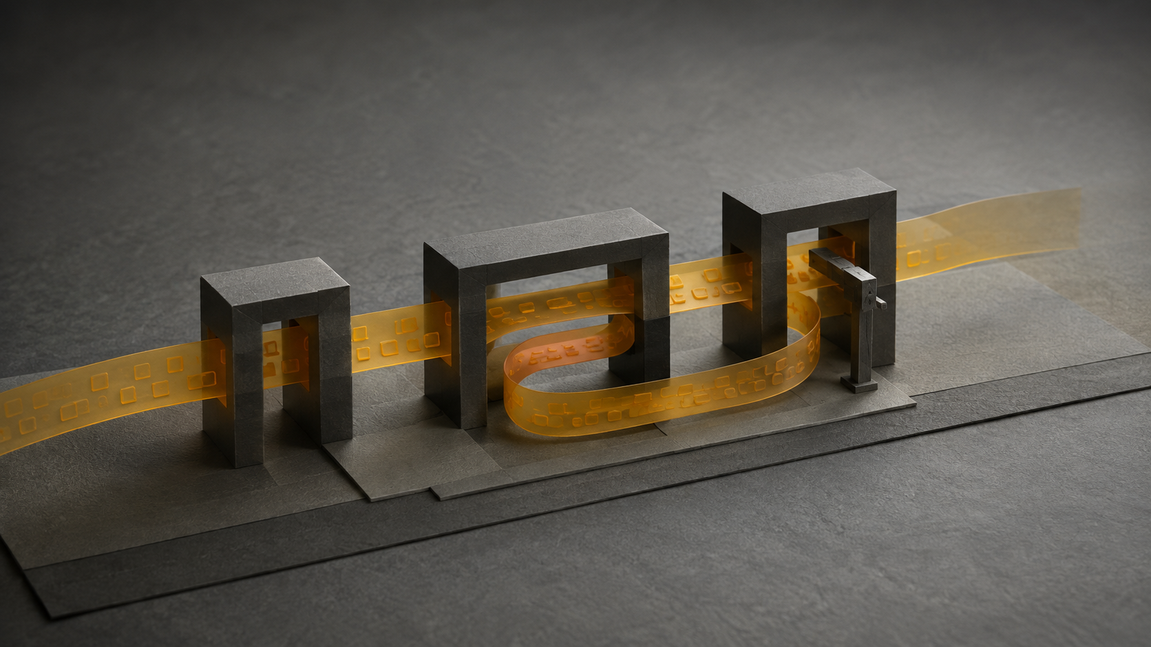 A marked amber ribbon passes through three graphite gateways, bends back internally and meets a small stop.