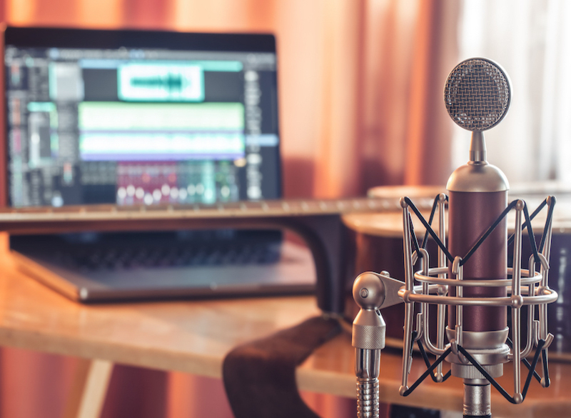 -Professional-microphone-on-blurred background-sound-recording-concept-