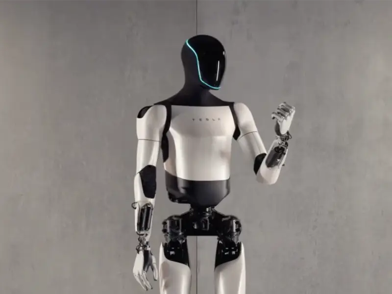 The image is about Tesla's robot Optimus.