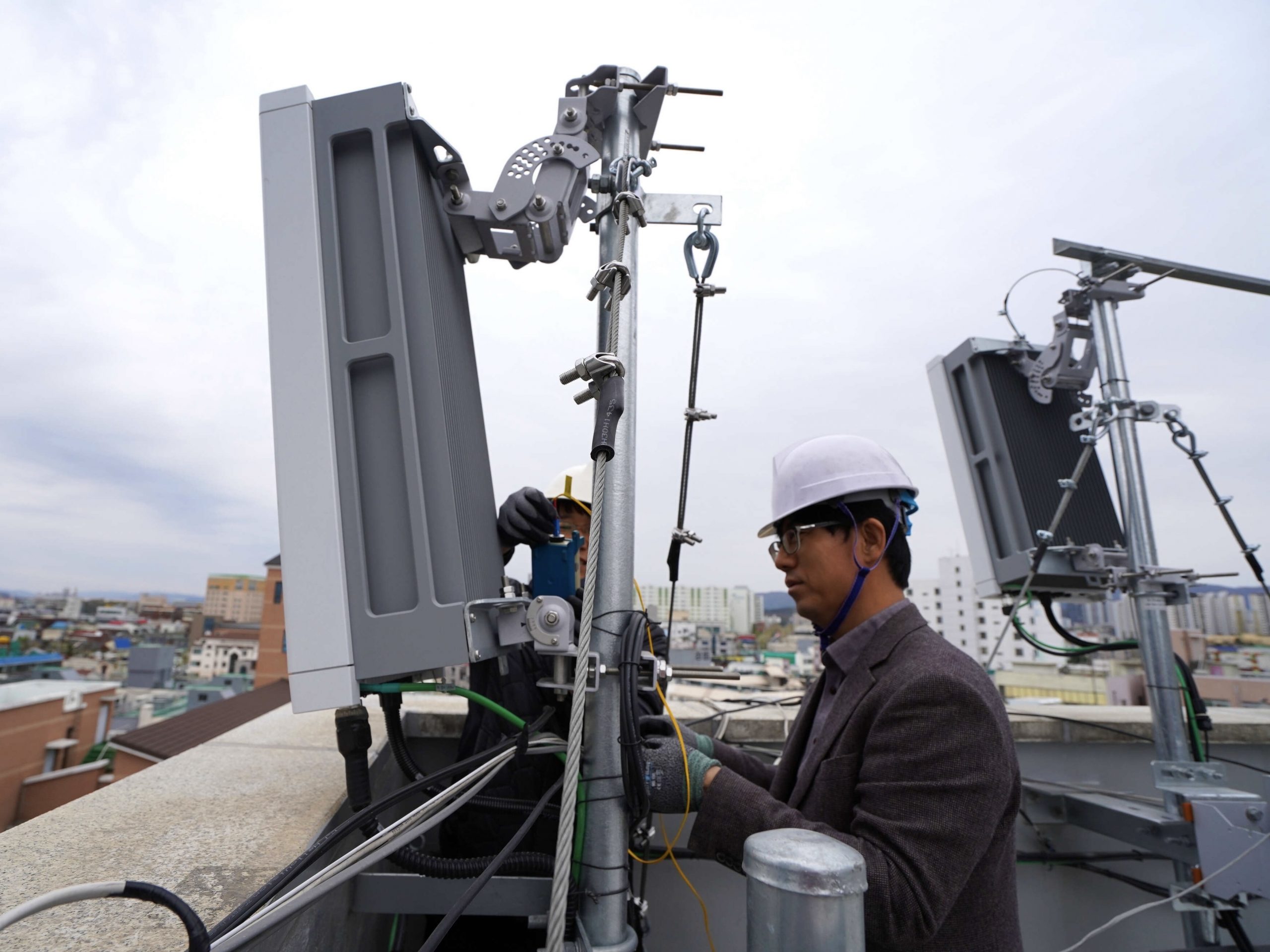Ericsson engineer installing 5G antenna