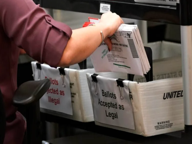 staff removing ballots illegally