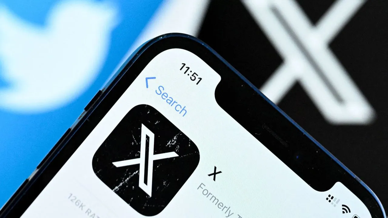 A photo taken on November 17, 2023 shows the logo of US online social media and social networking service X - formerly Twitter - on a smartphone screen.
